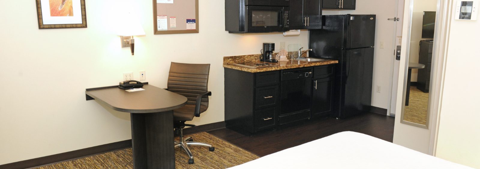 Studio suite showcasing a kitchen