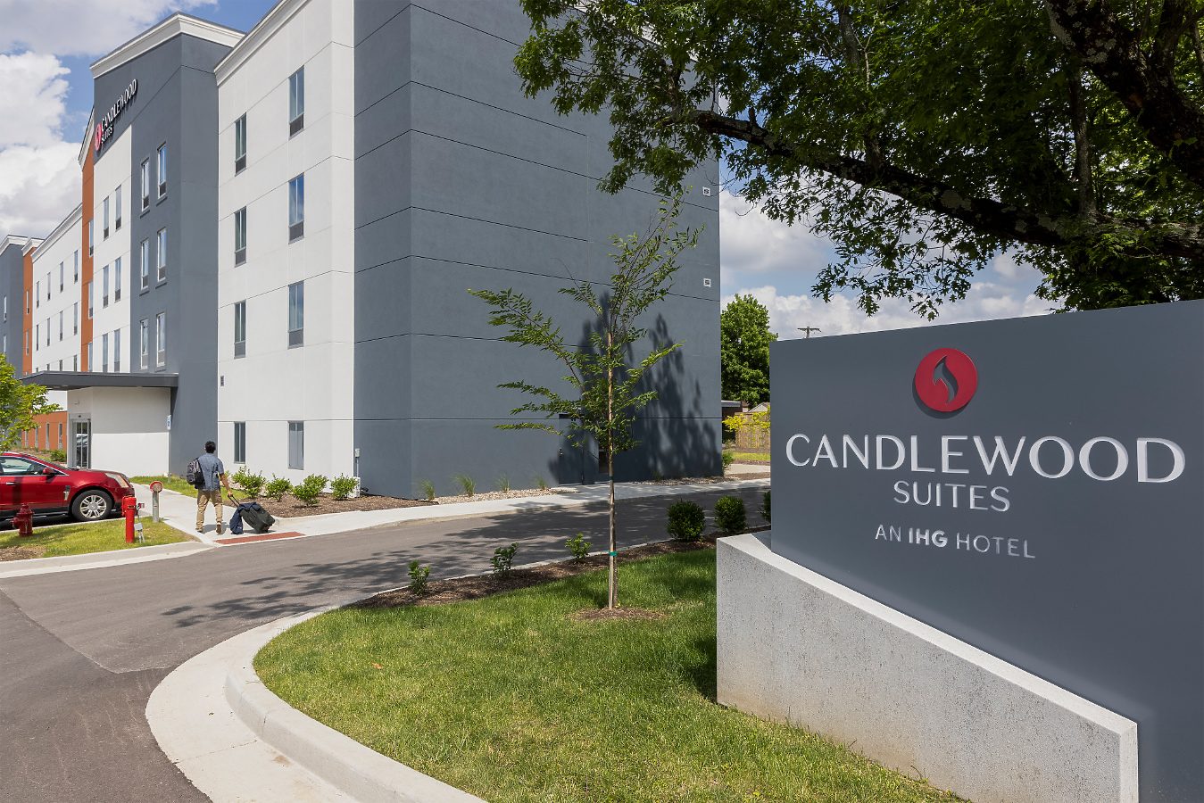 Exterior hotel showing Candlewood Suites logo sign